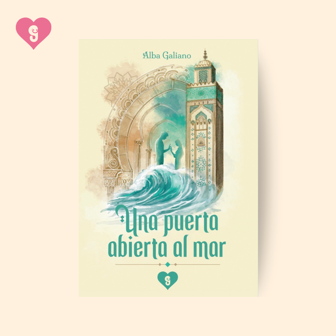Portada del libro «Una puerta abierta al mar», de Alba Galiano, sobre una mesa de madera frente al mar de Casablanca al atardecer.